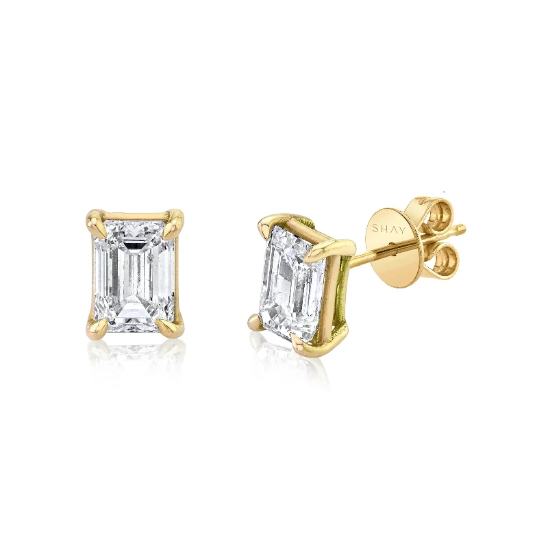 ladies engagement rings yellow gold classic -DIAMOND EMERALD CUT STUDS