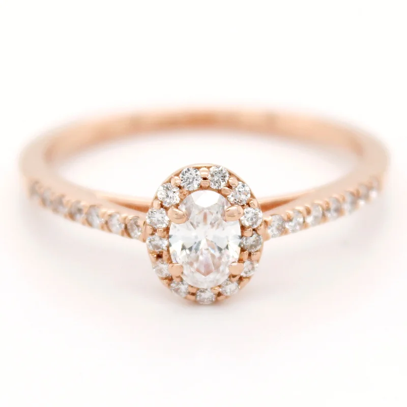 ladies engagement rings thin band elegance -Vintage 0.60ctw Sparkling Diamond Oval Halo Ring in 14k Rose Gold | Size 7.50