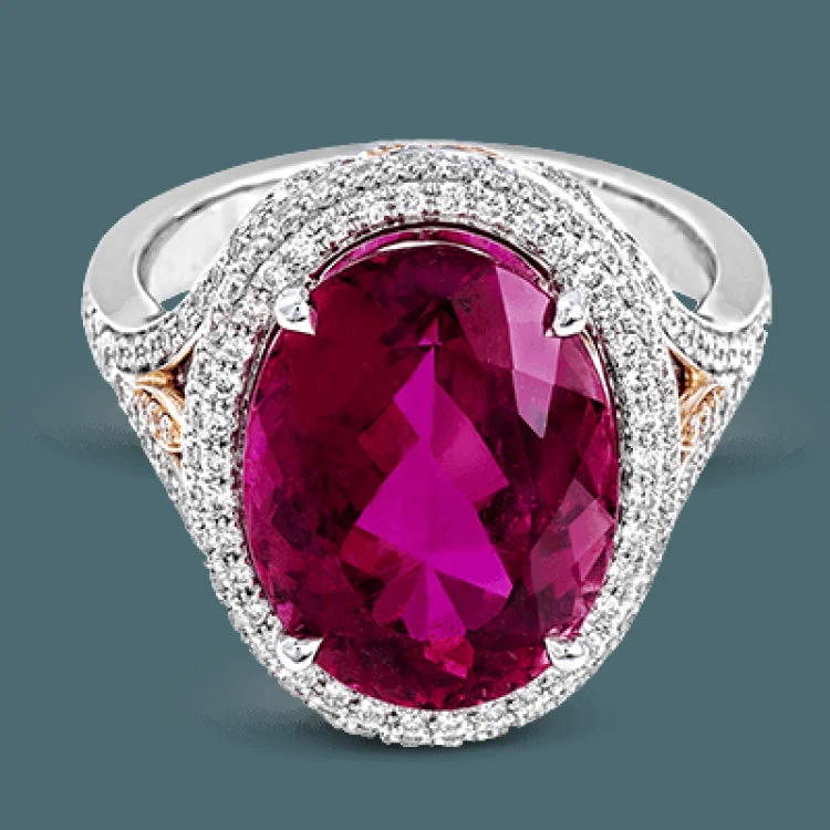 ladies rings layered stackable look -A beautiful 7.55 ct oval rubellite sits at the center of this enchanting 18k white gold ring with accents of 18k rose gold. A beautiful .70 ctw of white diamonds finishes this lovely design.