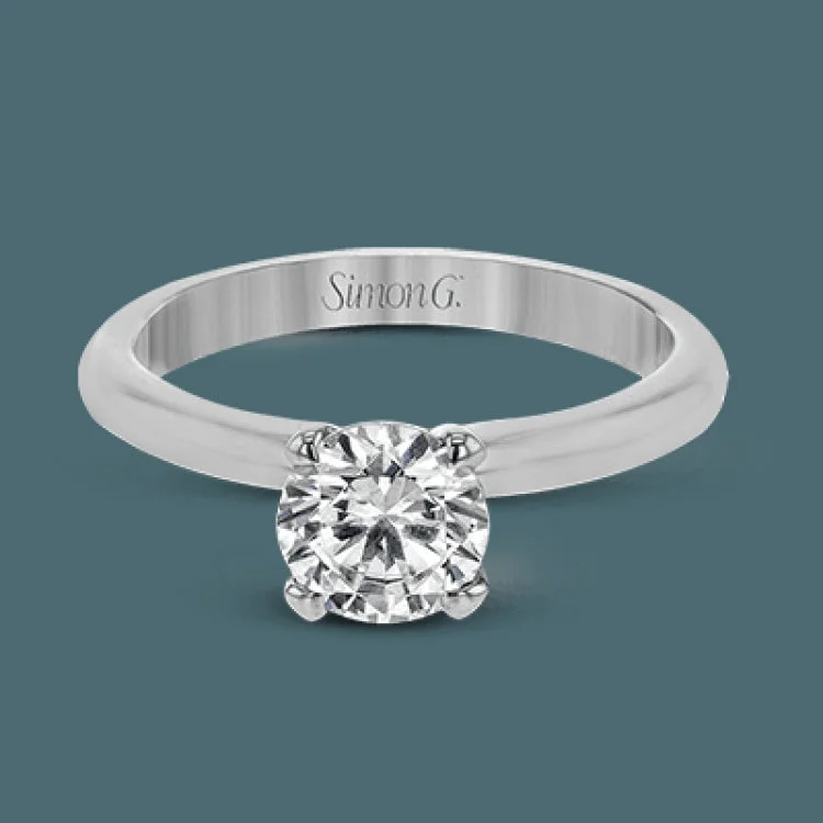 ladies rings personalized name ring -This sleek, unadorned white gold ring provides an elegantly modern setting for a single, central stone.