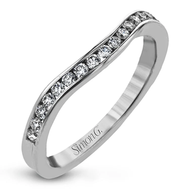 ladies rings trendy 2025 style -This classically designed white gold ring is emphasized by .18 ctw of white diamonds and .51 half moon shaped diamonds to create a memorable setting.