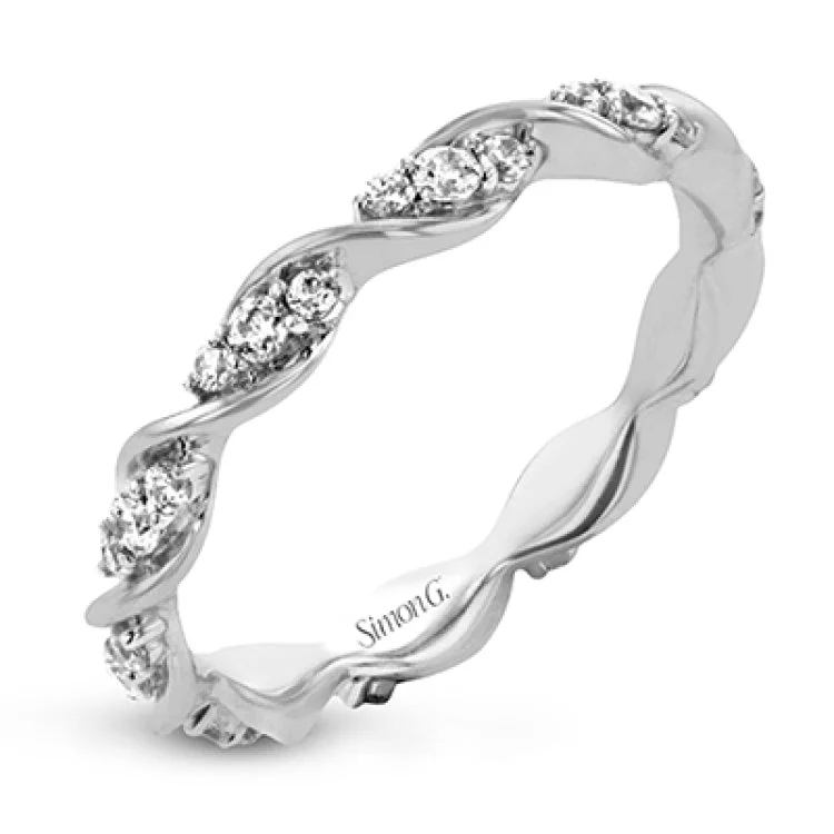 ladies rings stylish affordable -Featuring a contemporary stackable design, this white gold band is accented by a collection of .37 ctw of white diamonds.