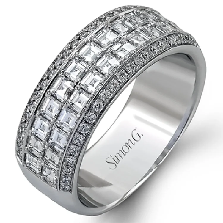 ladies rings for bold fashion -The perfect band for a special celebration, this anniversary ring features 1.53 ctw. square baguettes lined by a row of round diamonds 0.27 ctw.