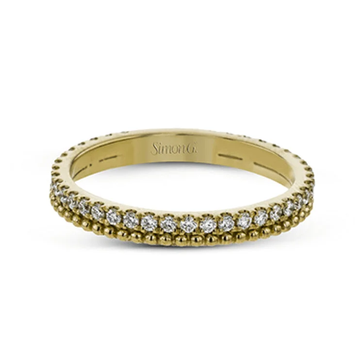 ladies rings thin band elegance -A line of .33 ctw of white diamonds sits alongside a row of granulation in this band that adds the ideal touch of shine. Perfect for stacking with other rings.