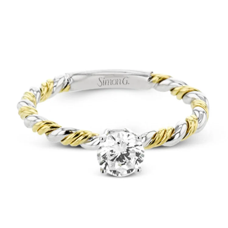 ladies rings for young women -White and yellow 18k gold twine around each other in this ring that puts a twist on a classic design.