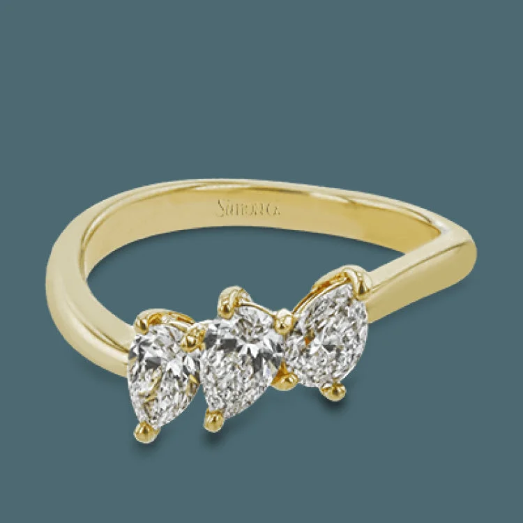 ladies rings romantic delicate style -This ring provides a distinctive take on a three stone ring that can be worn on an every day basis, with three pear shaped diamonds totaling .91 ctw nestled together.