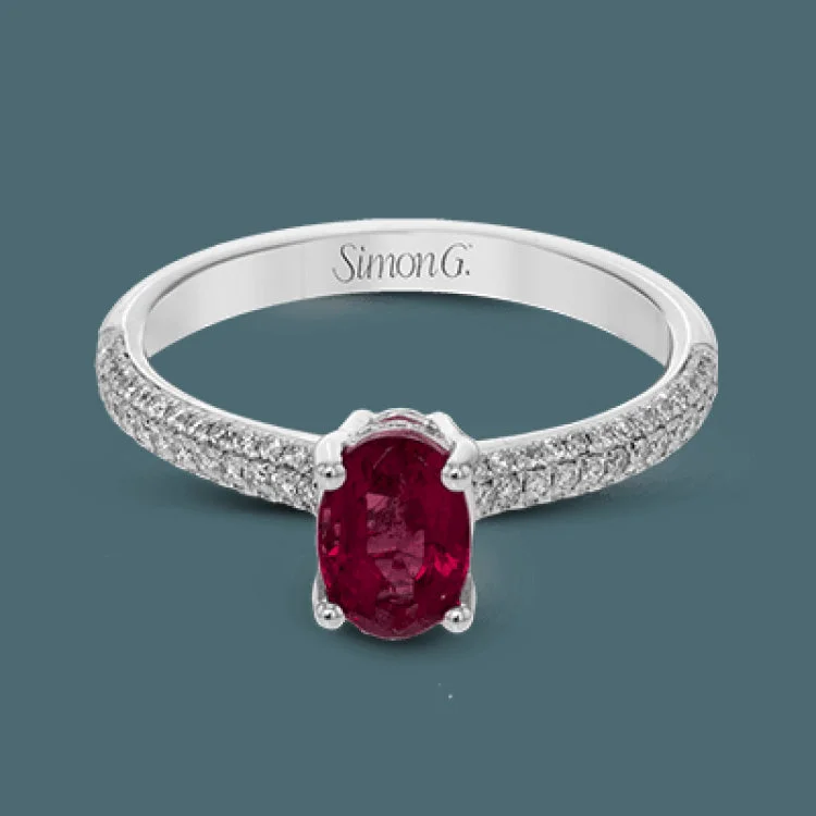 ladies rings elegant gold tone -This graceful ring features .31 ctw of white diamonds set into the ring with a .90 ctw ruby.