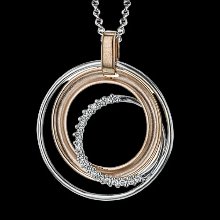 ladies rings gold elegant design -Interlocking rings of white and rose gold are accented with a subtle .13 ctw of white diamonds in this sophisticated pendant design