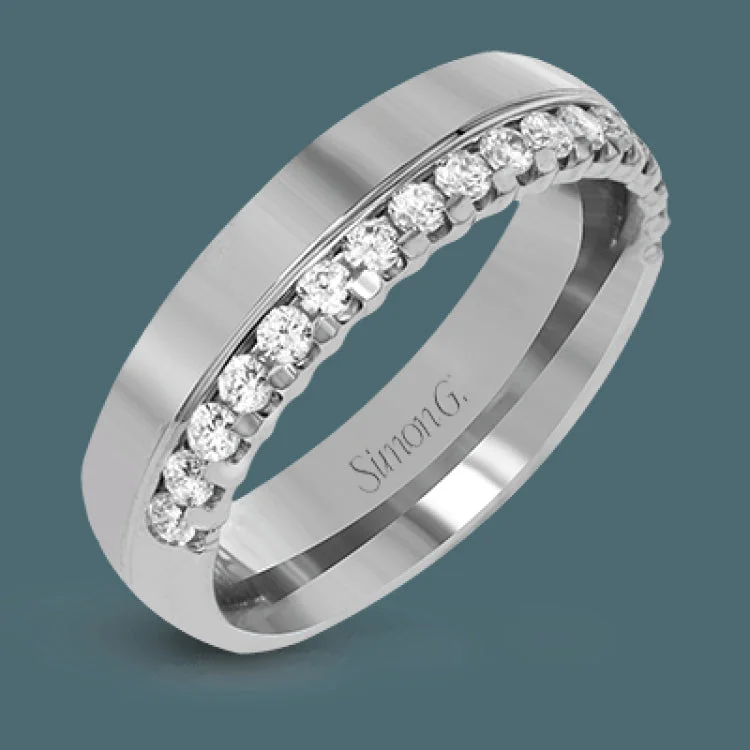 ladies rings personalized name ring -This modern unisex band features a statement row of diamonds totaling .47 ctw along one edge of the ring. The outside of the ring is crafted in white gold while the inside is rose gold.