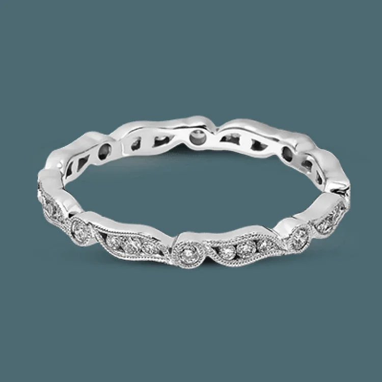 ladies rings thin band elegance -Featuring a contemporary stackable design, this white gold band is accented by a collection of .28 ctw of white diamonds.