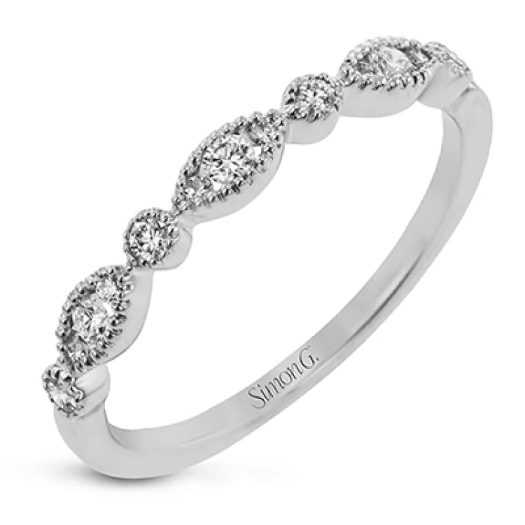 ladies rings for wedding vow -This ring is perfect for stacking with a distinctive design set with  .20 ctw of diamonds.