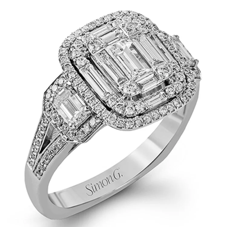 ladies rings for stylish women -This dramatic contemporary white and rose gold ring is highlighted by a sparkling halo set with .11 ctw pink diamonds and accented with .35 ctw round cut white diamonds, .38 ctw emerald cut diamonds, and .65 ctw baguette cut diamonds.