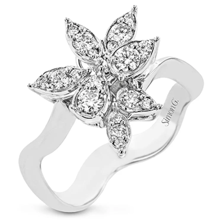 ladies rings with peridot green -This one of a kind floral design diamond ring set in 18K white gold, sparkles with 0.43 ctw of brilliant white diamonds