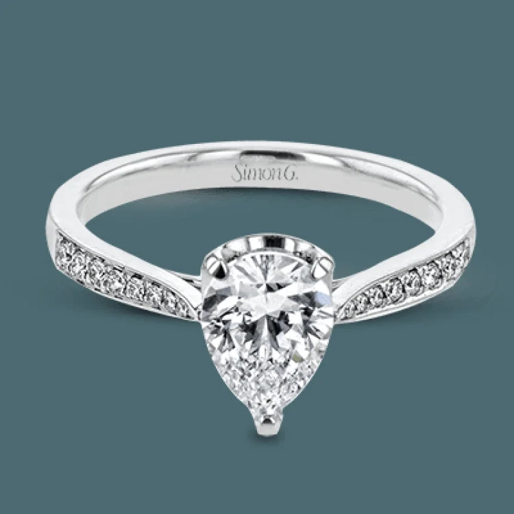 ladies rings trendy minimalist vibe -The delicate, understated design of this lovely white gold ring is elevated by .27 ctw of round white diamond accents.