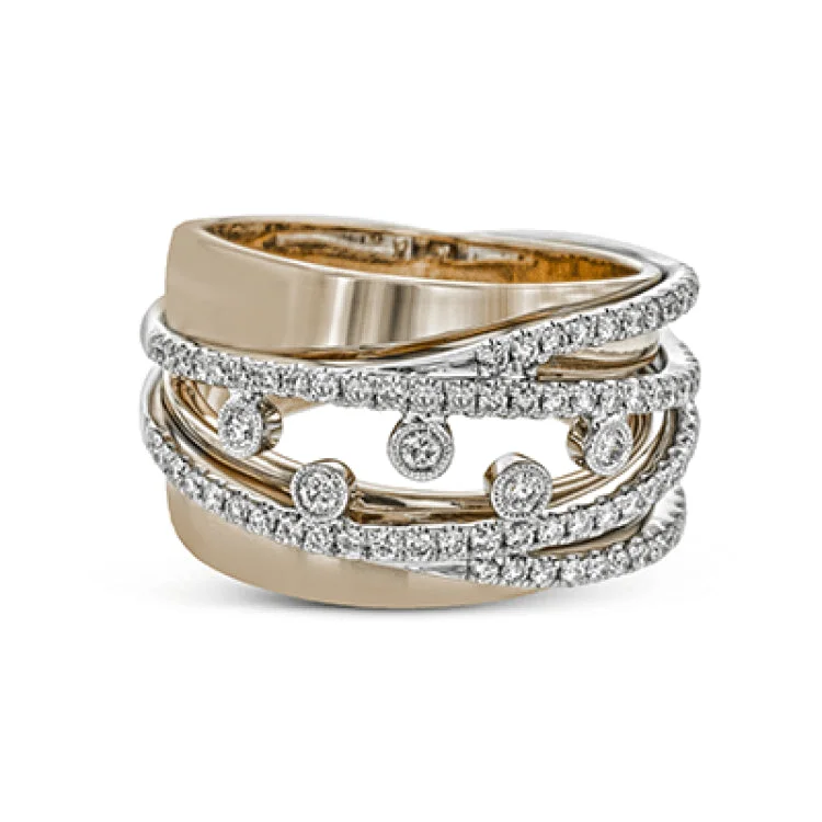 ladies rings vintage chic look -This magnificent ring glitters with .55 ctw of round white diamonds accentuating its complementary bands of white and rose gold.