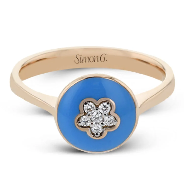 ladies rings stylish affordable -This charming 18k gold ring showcases a floral design in the midst of cheery, bright blue enamel. This is accented by .07 ctw of white diamonds.