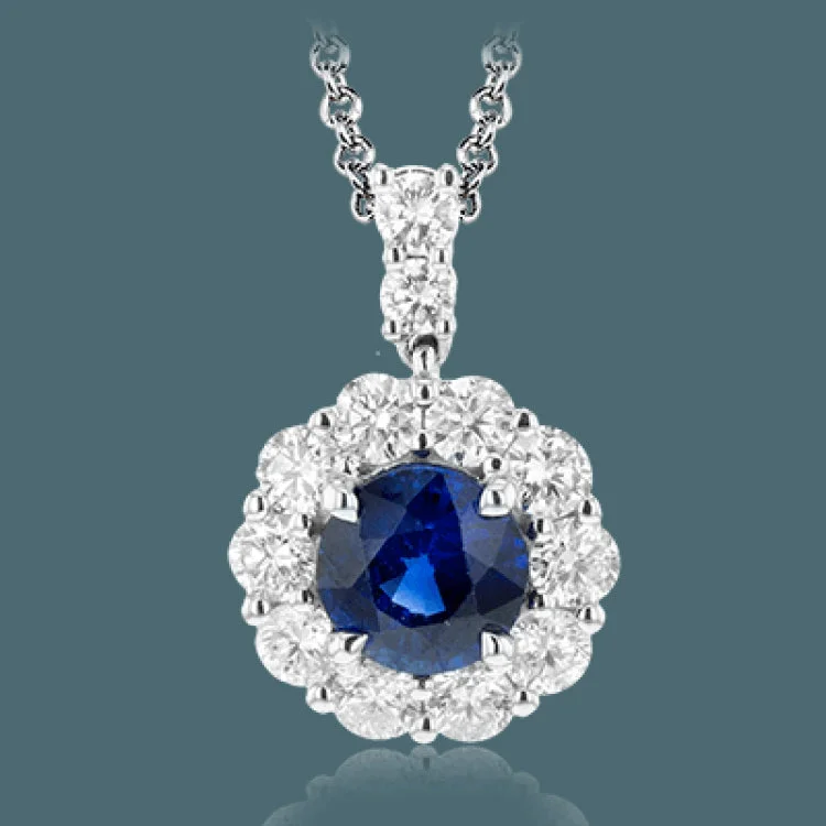 ladies rings for daily wear -Evoke classic elegance with this white gold pendant, featuring a 1.14 ctw round sapphire highlighted by .73 ctw of round white diamonds.