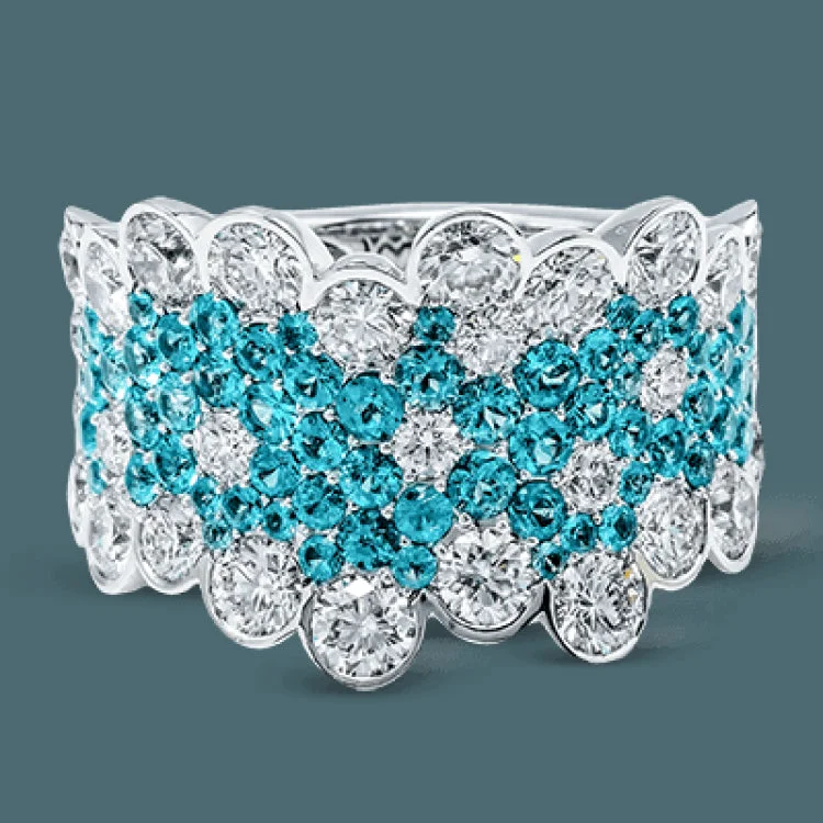 ladies rings with birthstone glow -Presenting a dazzling contemporary design, this white gold ring is set with 2.96 ctw of stunning white diamonds and 1.43 ctw eye-catching Paraiba tourmaline stones.