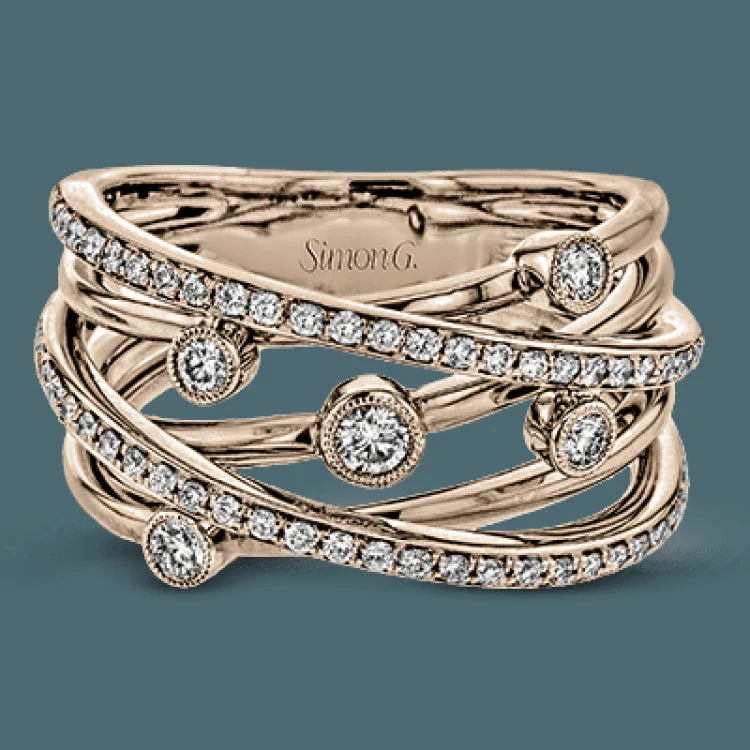 ladies rings simple delicate charm -Delicate yet substantial, this remarkable ring sparkles with .45 ctw of round white diamonds set in gorgeous white and rose gold.