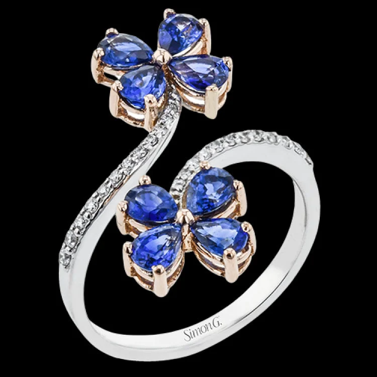 ladies rings luxury brand appeal -This floral inspired fahion ring shines with a swirl of diamonds 0.18 ctw. in 18K white gold, and has 2 blooms at the ends, with petals made of pear-shaped sapphires 1.90 ct. set in rose gold