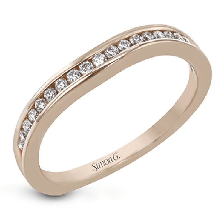 ladies rings with rainbow gems -This delicate white gold ring features lovely rose gold accents on the shank and is set with .24 ctw of round cut white diamond accents.