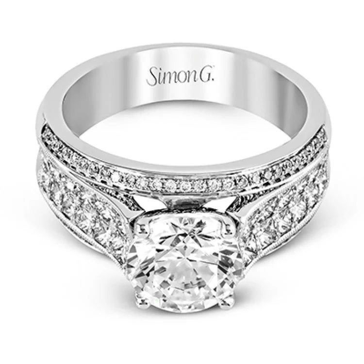 ladies rings for proposal gift -This impressive modern white gold ring features .18 ctw of glimmering round cut white diamonds accentuated by .97 ctw princess cut diamonds.