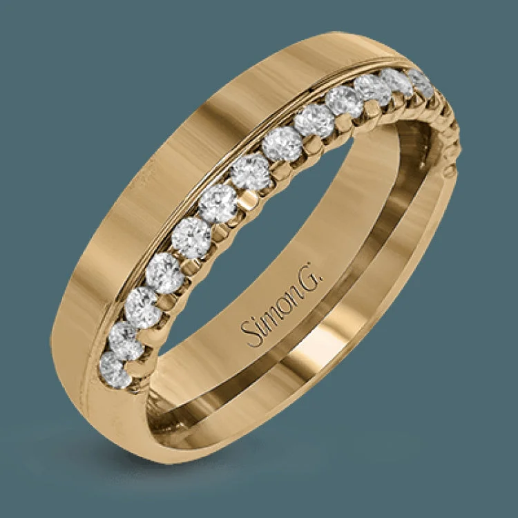 ladies rings for young women -This modern unisex band features a statement row of diamonds totaling .47 ctw along one edge of the ring. The outside of the ring is crafted in white gold while the inside is rose gold.