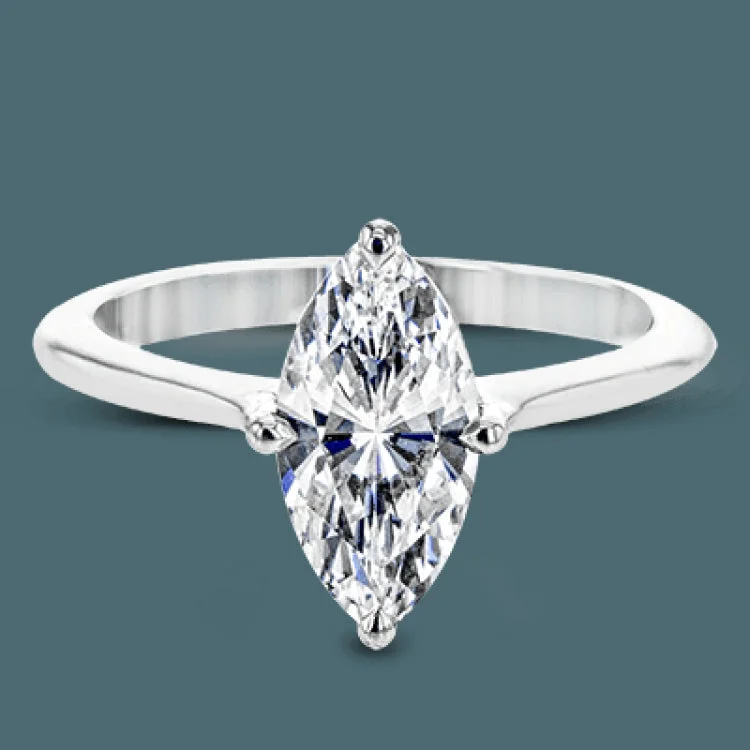 ladies rings stylish affordable -This solitaire ring design is built to perfectly showcase a beautiful marquise shaped center stone.