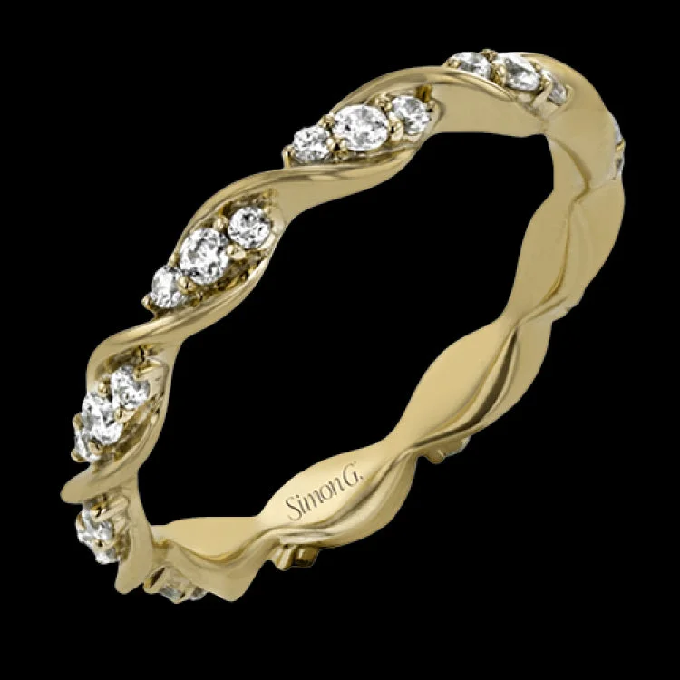 ladies rings with pink sapphire -Featuring a contemporary stackable design, this yellow gold band is accented by a collection of .37 ctw of white diamonds.