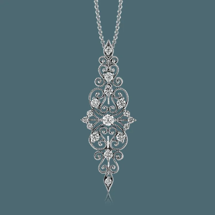 ladies rings for anniversary love -The lacy filigree design of this vintage style white gold pendant is highlighted by .69 ctw of shimmering round cut white diamonds.