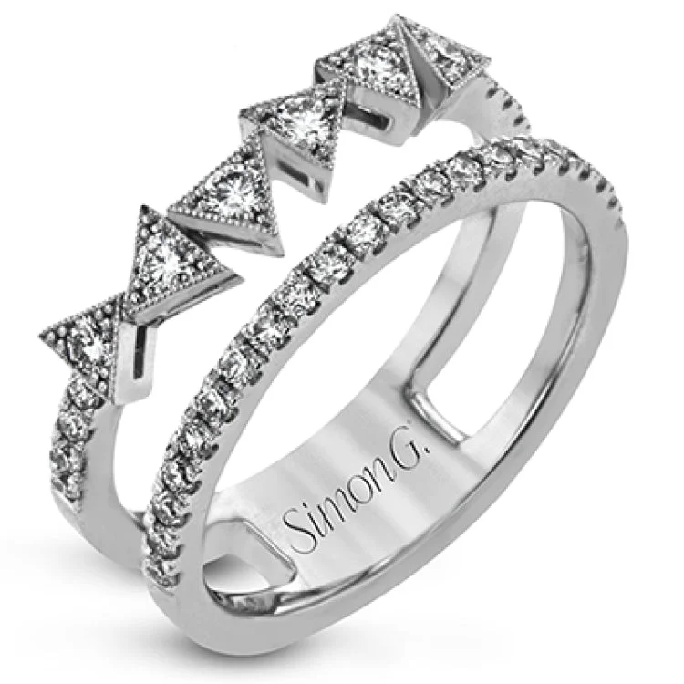 ladies rings for special occasions -This unique white gold ring gives the look of two rings in one, with a geometric arrangement of triangles on one sides. The ring contains .53 ctw of white diamonds in total.