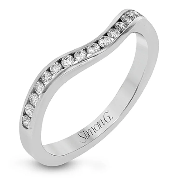 ladies rings for wedding vow -Featuring a lovely contemporary design, this white gold ring is complemented by a halo of .28 ctw round cut white diamonds and accented with .44 ctw moon shaped diamonds.