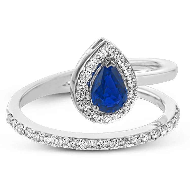 ladies rings with teal turquoise -This spiraling 18k white gold ring features a .54 ct pear shaped blue sapphire accented by .33 ctw of white diamonds.