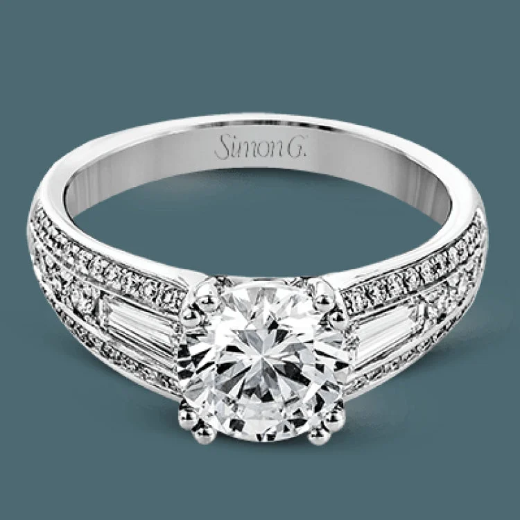 ladies rings floral pattern beauty -The charming design of this white gold contemporary ring is accented by .36 ctw baguette cut diamonds and .33 ctw round cut white diamonds.