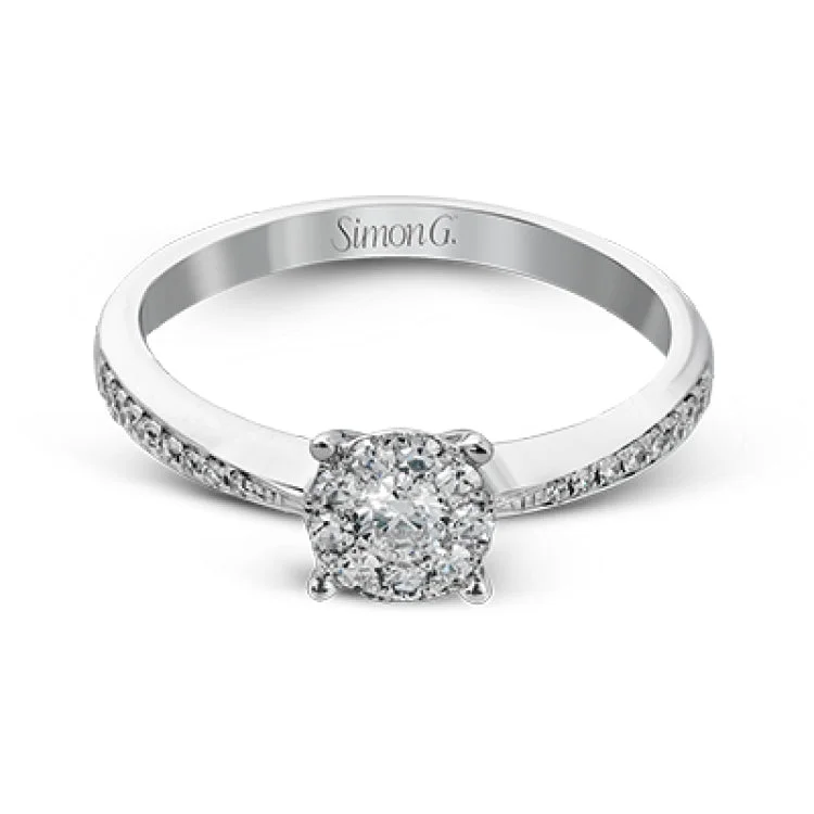 ladies rings simple delicate charm -This lovely 18k white gold ring features a center diamond mosaic as well as diamonds extending down the sides of the ring, all totalling .38 ctw.