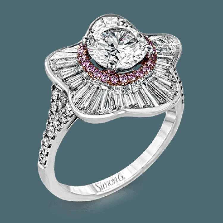 ladies rings heart shaped romance -This modern white gold ring features an eye-catching floral design set with .19 ctw of round cut white diamonds complemented by .13 ctw pink diamond accents and 1.23 ctw of baguette cut diamonds.