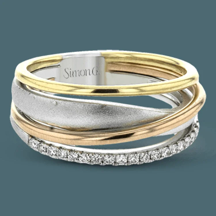 ladies rings heart shaped romance -Interlocking rings of three-tone gold are accentuated with .15 ctw of round white diamonds to make this strikingly modern band truly special