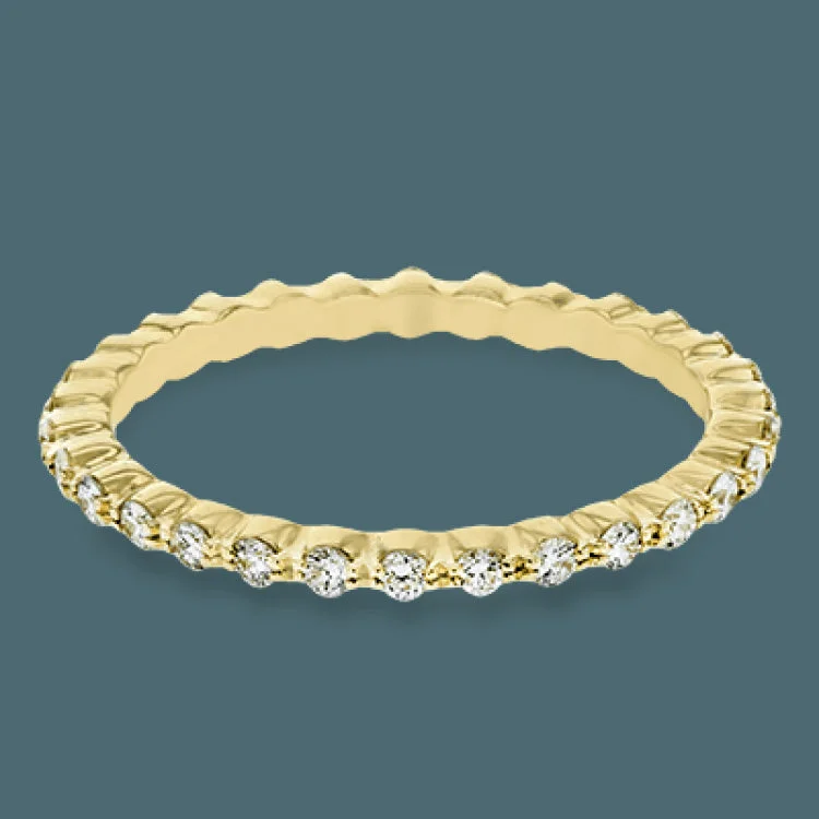 ladies rings infinity symbol charm -Featuring a modern stackable design, this band yellow gold is accented by .40 ctw round cut white diamonds.