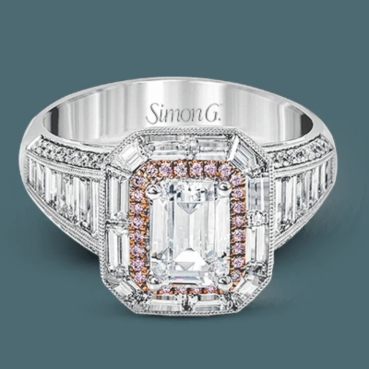 ladies rings with peridot green -This lovely 18k white and rose gold ring has a graduated design which leads up to a rectangular center stone setting. The ring contains .18 ctw of round diamonds, .07 ctw of pink diamonds, and 1.48 ctw of baguette diamonds.