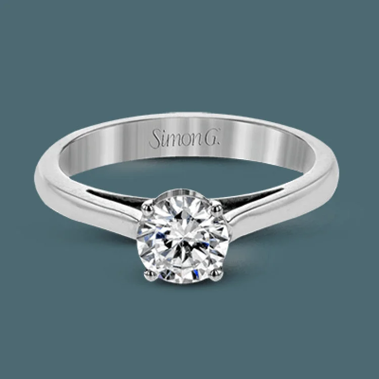 ladies rings hypoallergenic material -The sleek, modern design of this white gold ring only serves to accentuate the beauty of its centerpiece.