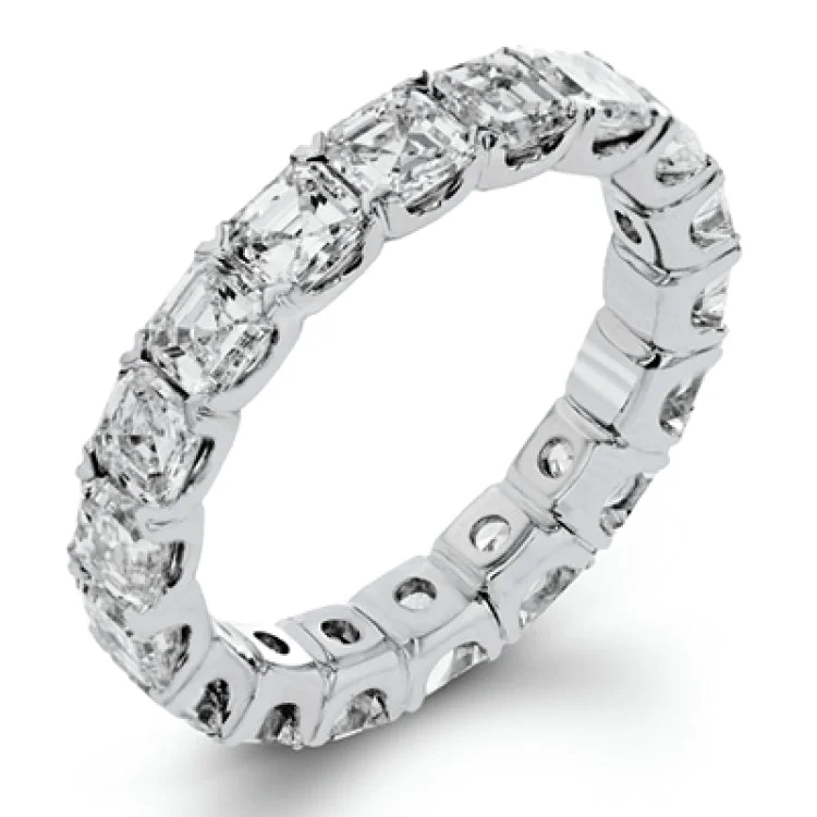 ladies rings timeless beauty -This lovely 18k white gold eternity band is a classic design with a vintage inspired twist, with 4.64 ctw of Asscher cut diamonds extending around the entirety of the ring.