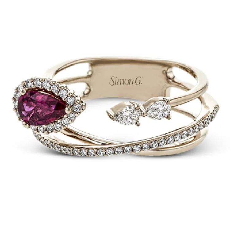 ladies rings with pink sapphire -This dynamic 18k rose gold ring features a .45 ct ruby gemstone and .32 ctw of pear and round shape white diamonds.