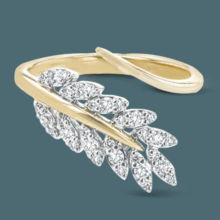 ladies rings bold statement piece -A sparkling leaf is crafted from two tones of gold in this remarkable ring that is set with .30 ctw of white diamonds.