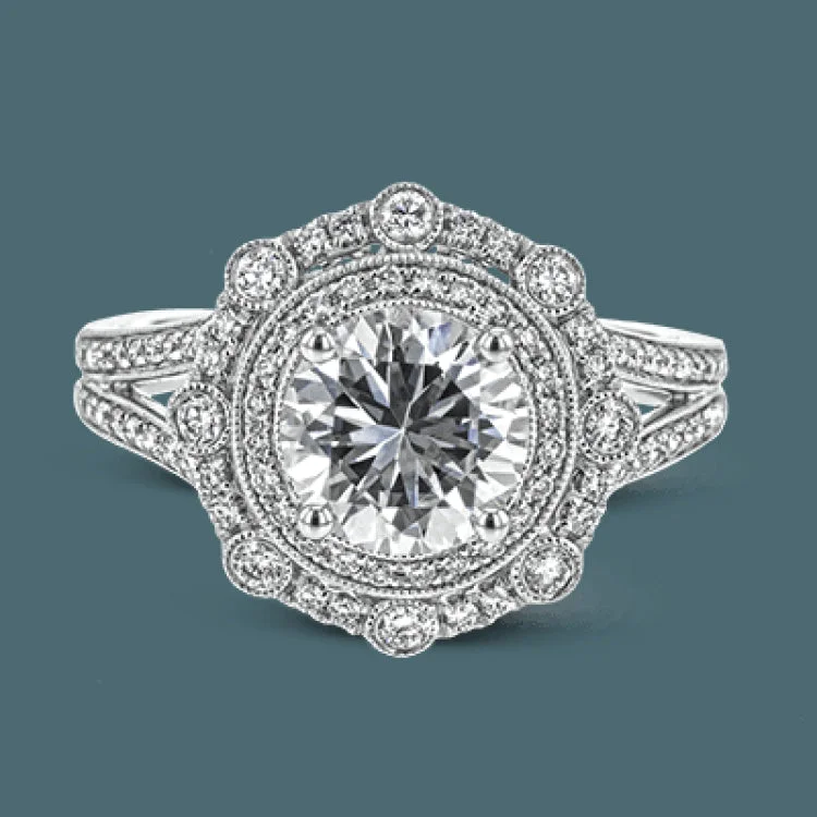 ladies rings adjustable fit size -This magnificent white gold ring features a split shank and elaborate double halo with delicate milgrain edging, all sparkling with .42 ctw of round white diamonds.