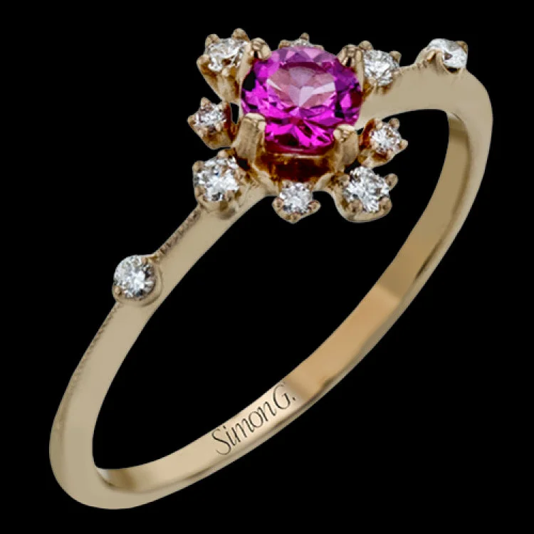 ladies rings boho inspired design -This charming 18k rose gold ring is perfect for stacking and contains a .28 ct center pink spinel stone and .13 ctw accent diamonds.