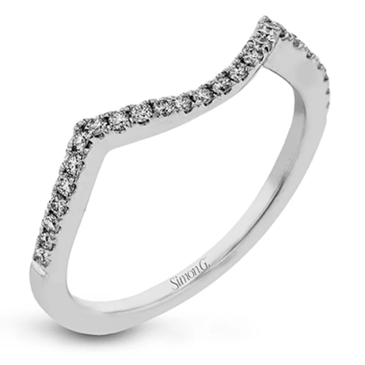 ladies rings geometric unique shape -Delicate yet substantial, this white gold ring accentuates an oval shaped centerpiece with .43 ctw of round white diamond accents.