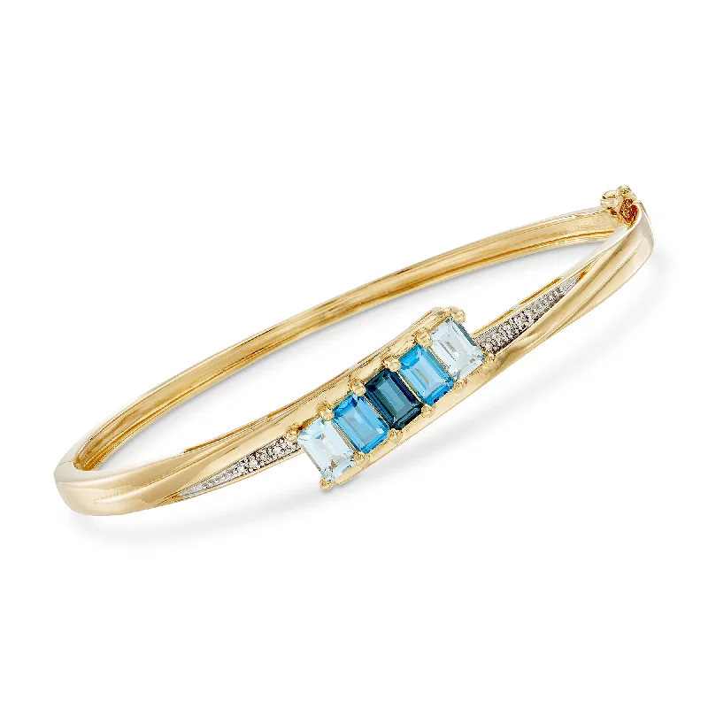 bracelets with green emerald -Ross-Simons Tonal Blue Topaz Bangle Bracelet With Diamond Accents in 18kt Gold Over Sterling