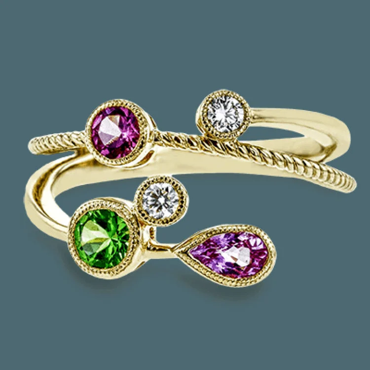 ladies rings for gifting ideas -This contemporary crossover ring crafted in 18k yellow gold features .13 ctw of white diamonds, .30 ctw of green tsavorite, .28 ctw of pink sapphire and .20 ct of pink spinel.