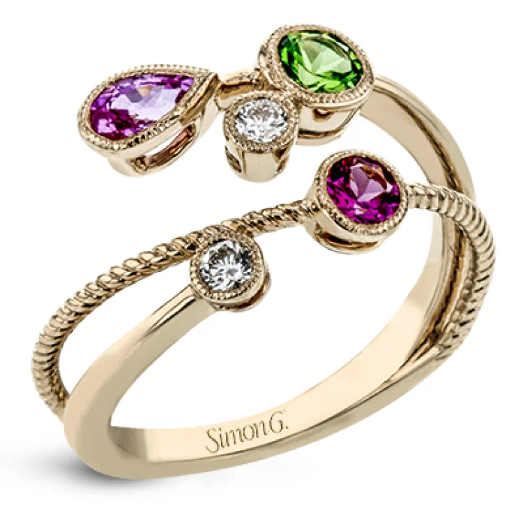 ladies rings with diamond sparkle -This 18k rose gold spiral ring is sprinkled with colorful gemstones embodying the spirit of springtime, including round white diamonds, a green tsavorite garnet, a pink sapphire and a spinel.