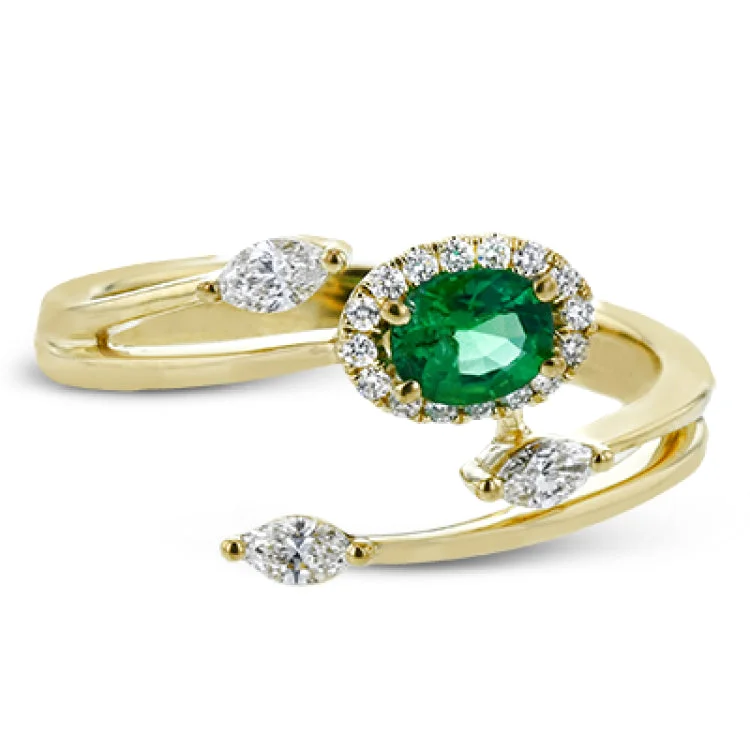 ladies rings gold elegant design -This delightful 18k white and yellow gold ring is set with one .25 ctw emerald and .06ctw of white diamonds and .16ctw marquise diamonds in its bypass design